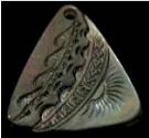 Carved pearl shell