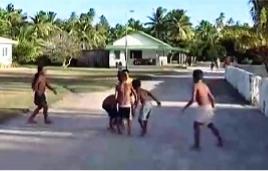Mitiaro children playing football