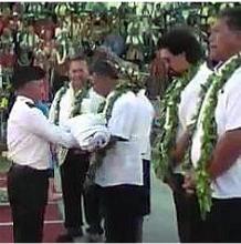 Handing over the Pacific Games flag