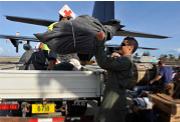 Unloading Red Cross blankets